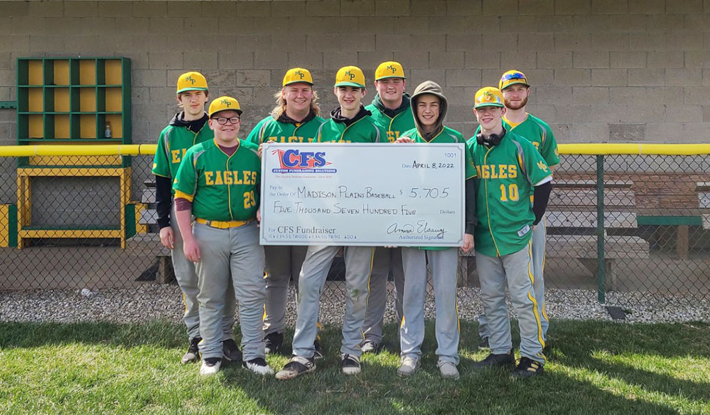 Group of People Showcasing a Mattress Fundraiser Cheque